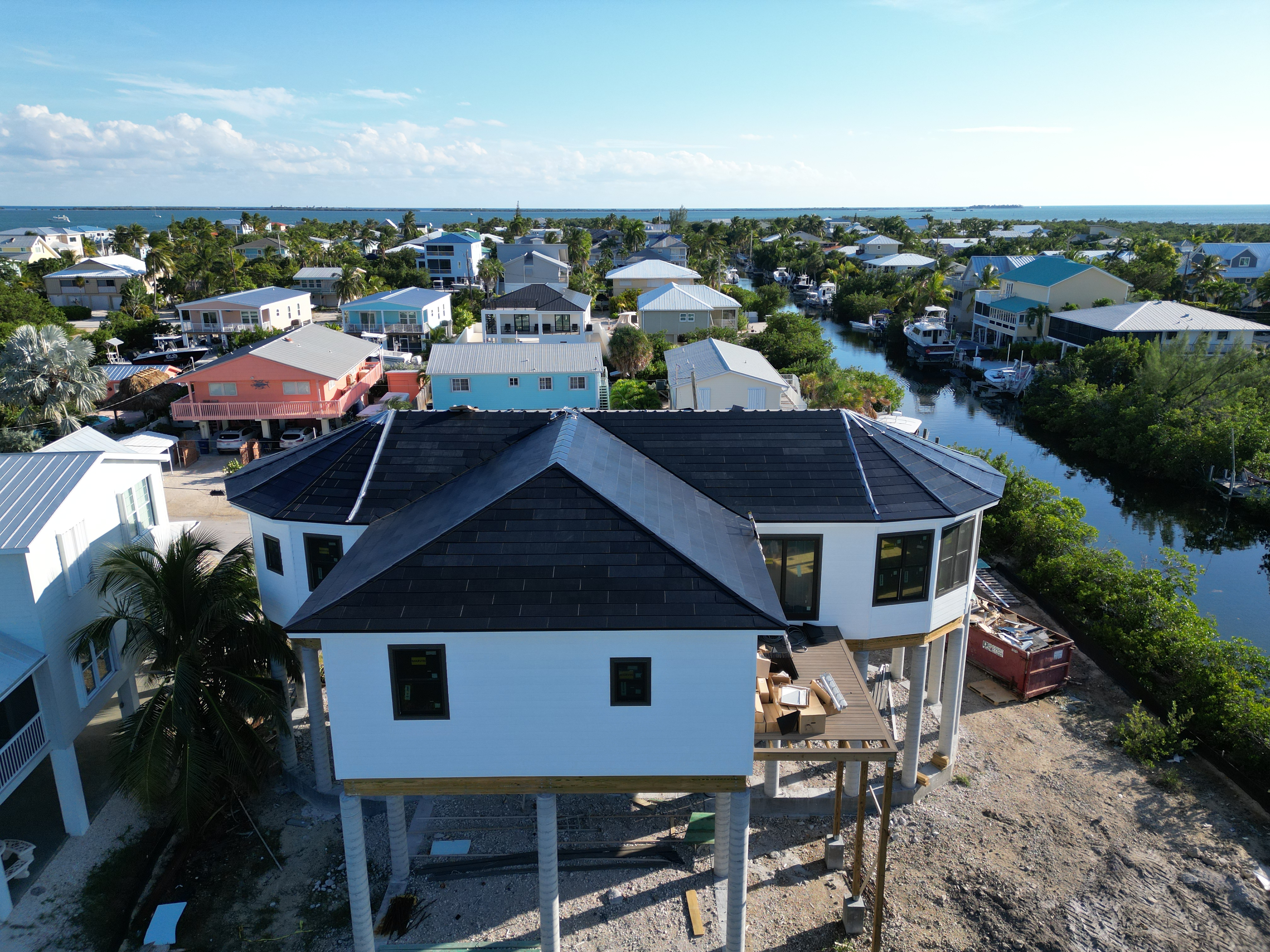 Elevated coastal home with Tesla Solar Roof in the Florida Keys